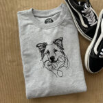 grey pull over with border collie print